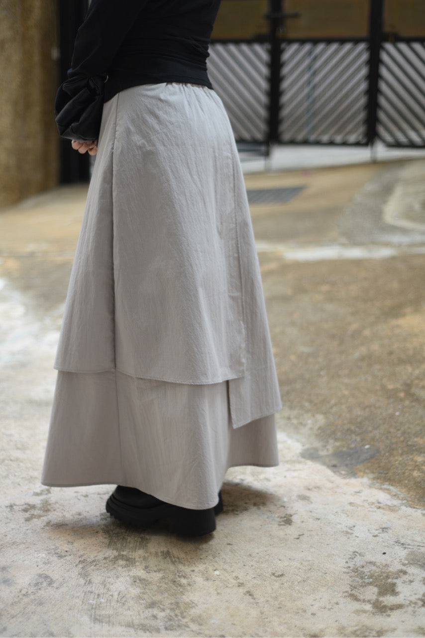 雙層造型感不規則下擺長裙